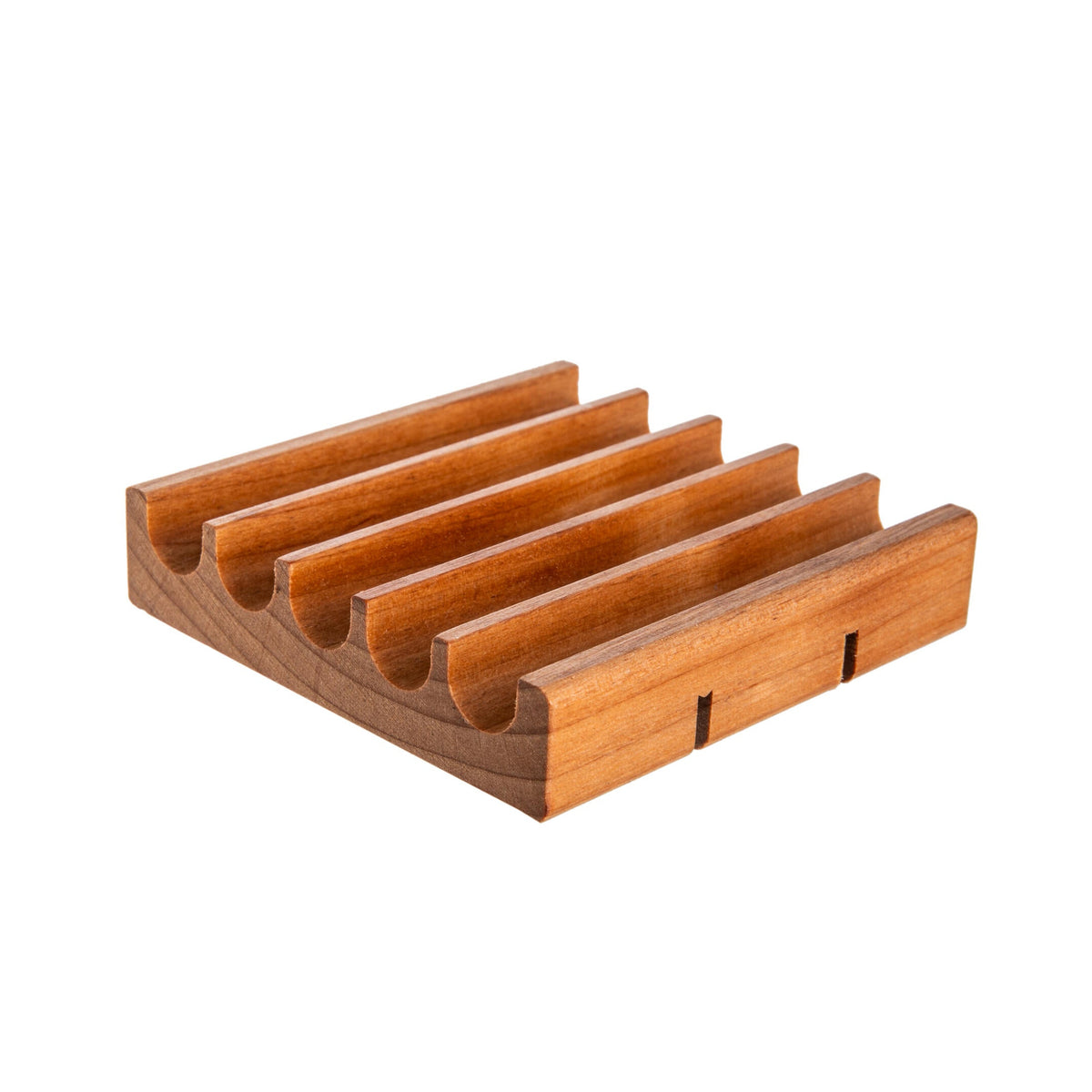 Wooden soap dish with multiple slots on a white background