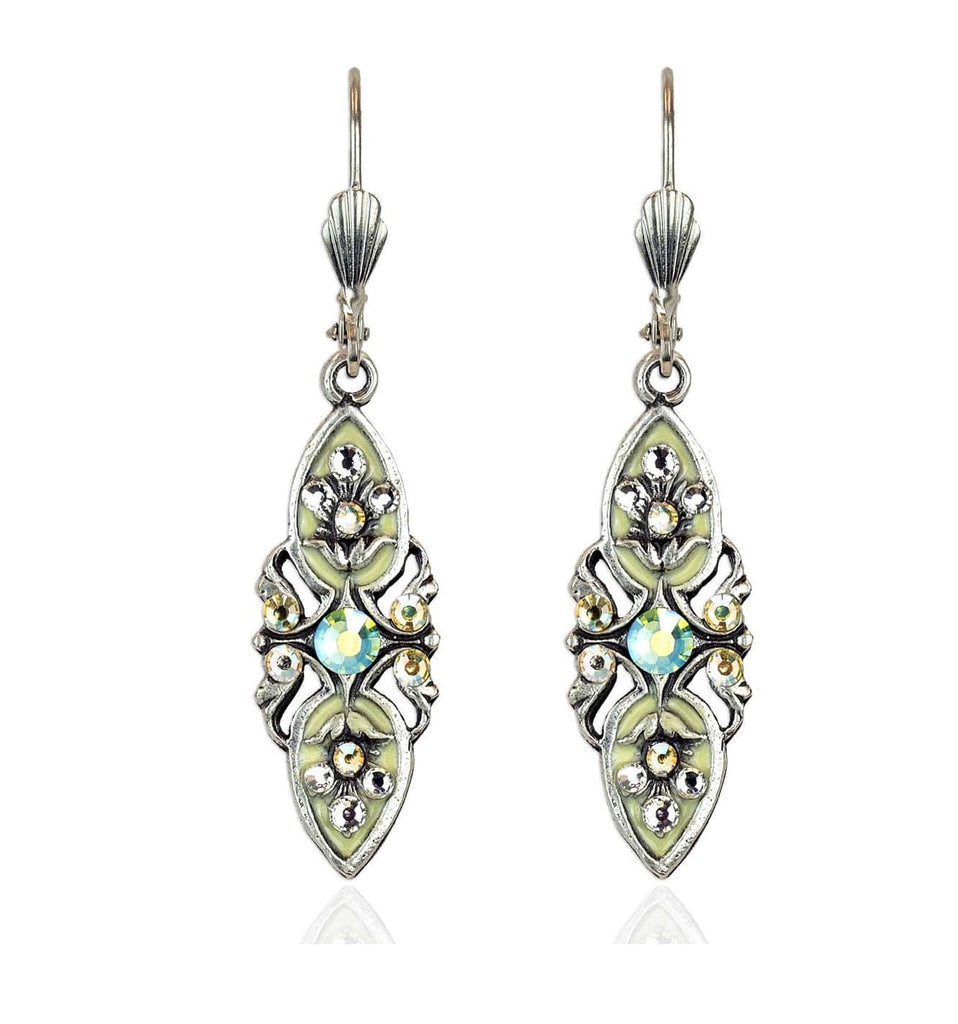 Featuring vintage inspired filigree findings, these gorgeously elegant earrings are hand painted in yellow enamel and embellished with sparkling crystals refracting colors of yellow, pink and green. Made in the USA. Silver-plated castings. Crystal accents. Surgical steel posts. Dimensions: 7/8" x 1/4". Made in the USA.