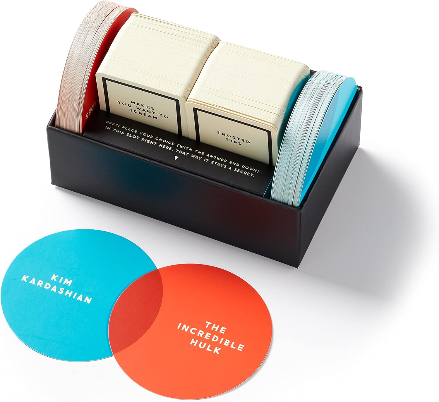 We have more in common than you might think. In fact, that's kind of the point of this game. This Venn diagram-based party game is all about finding hilarious similarities between two random things. Just draw the included red and blue discs to create unexpected pairings and then compete with friends to try to find the funniest thing that they both have in common. 3-8+ players.