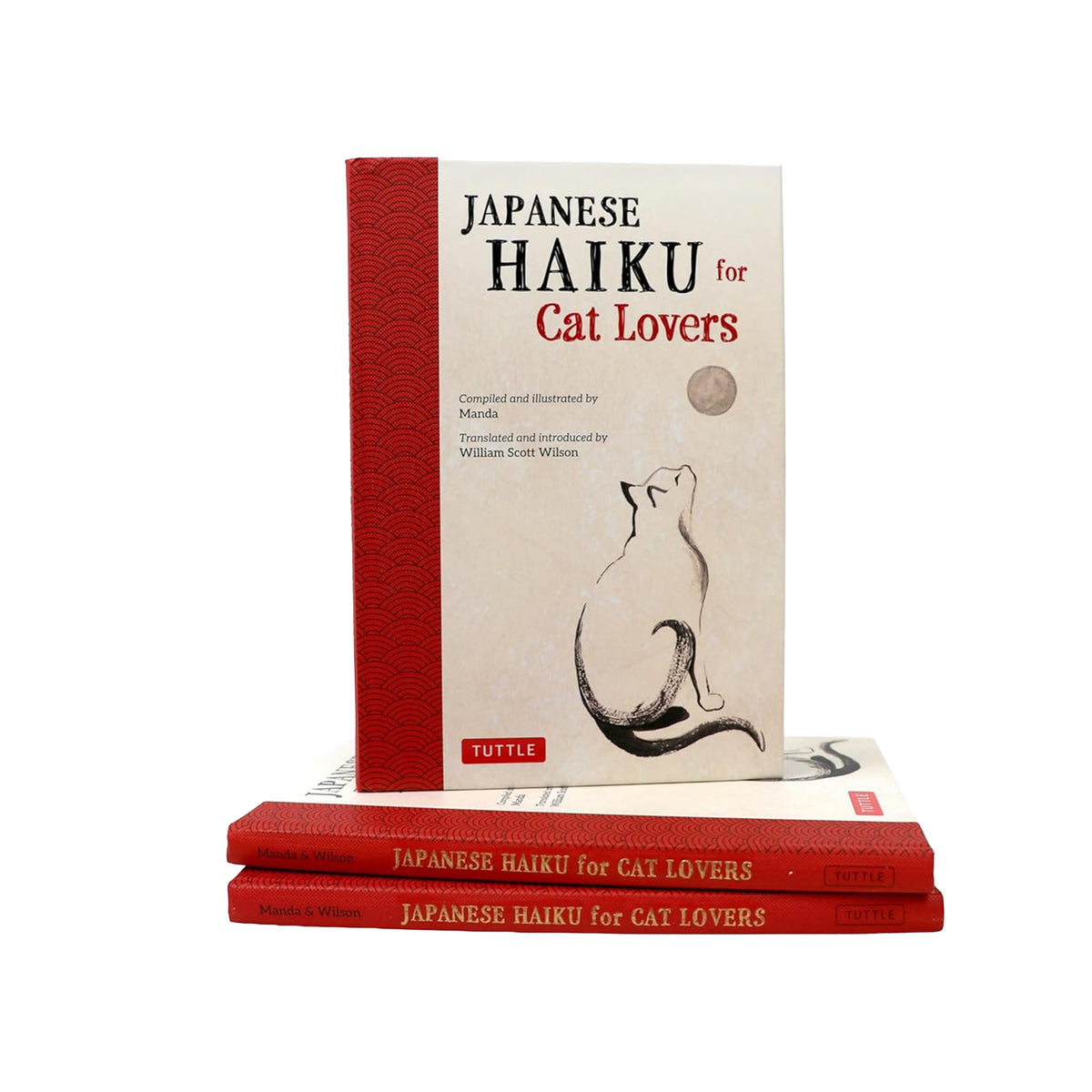Stack of books titled 'Japanese Haiku for Cat Lovers' on a white background