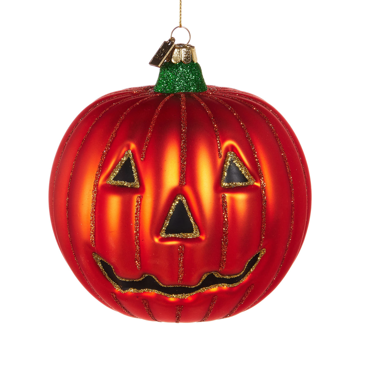Decorative pumpkin ornament with jack-o&#39;-lantern face on a white background