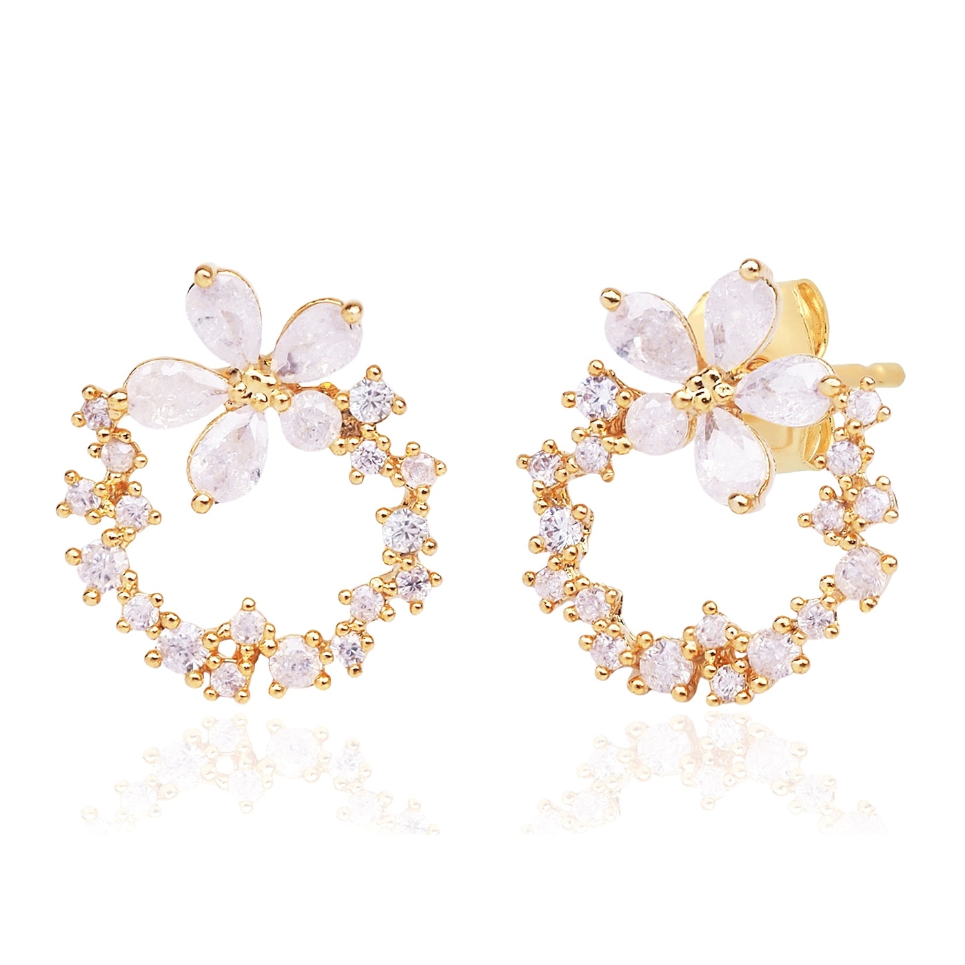 Pair of gold hoop earrings with floral designs on a white background