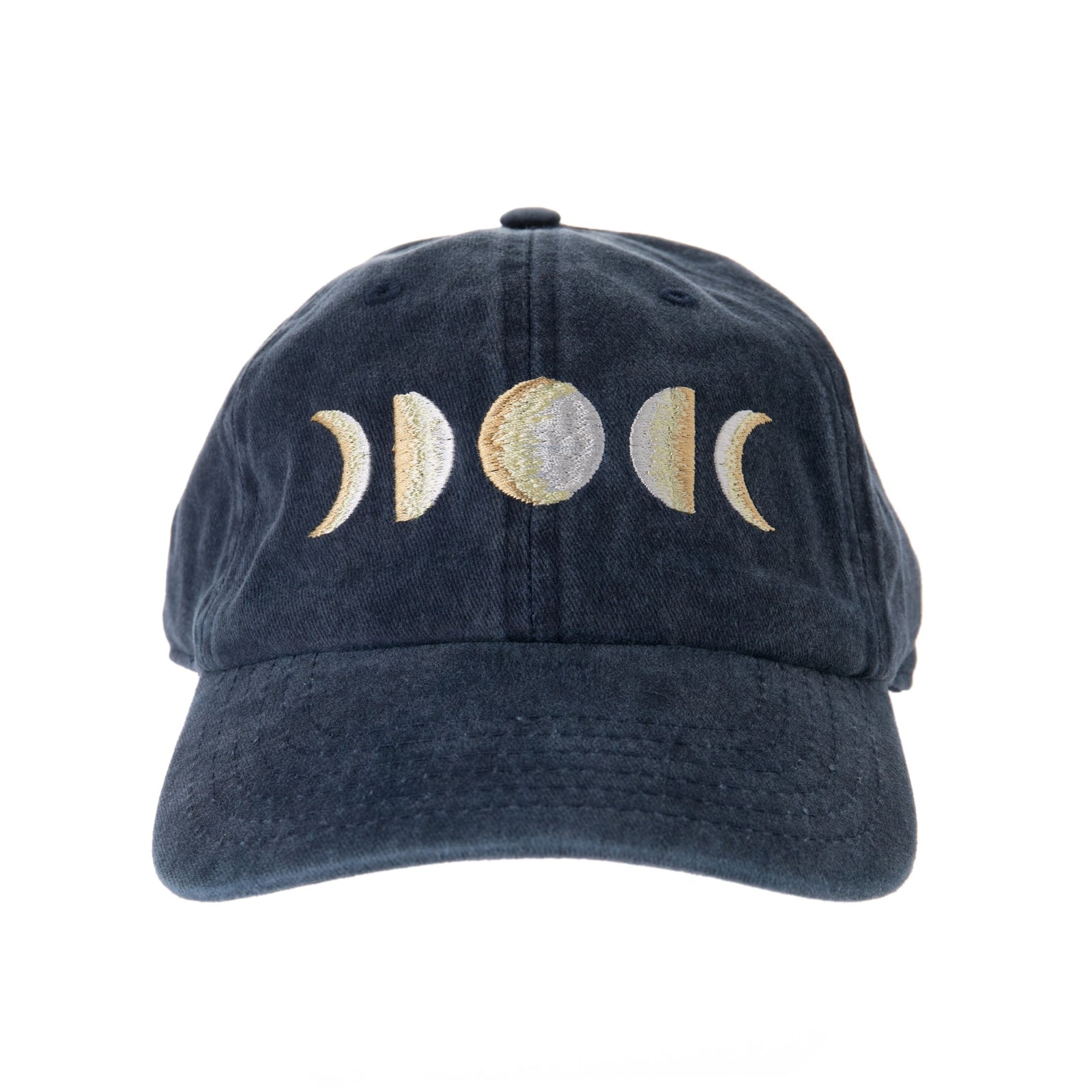 This comfortable cotton baseball cap features an embroidered "It's Just A Phase" sentiment with stitched moon phase design. Navy cotton base with adjustable brass closure on the back. Cotton baseball cap Metal buckle at the back for adjustment One size fits most. Hand-wash only.