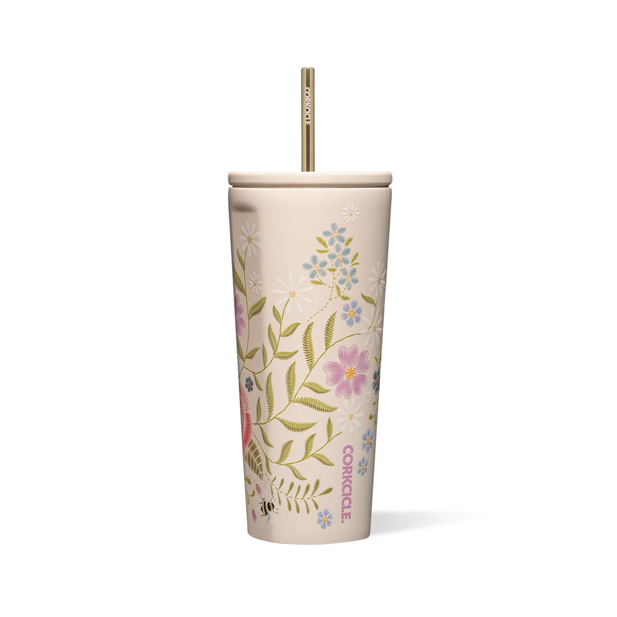 A tall, insulated tumbler with a lid and a gold metal straw, featuring a delicate floral pattern in pink, blue, green, and white on a warm beige background. The brand name 'CORKCILE' is printed vertically near the bottom.