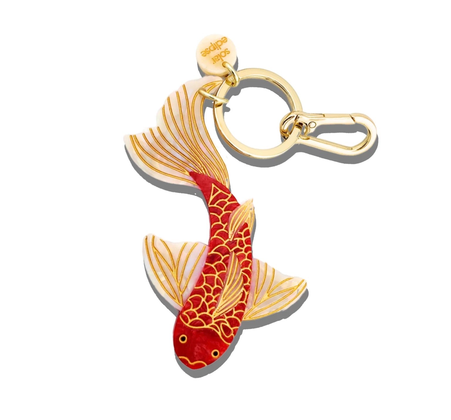 This vibrantly colored Koi fish key chain / bag charm has a hand-painted finish and is crafted in small batches. It's designed to upgrade your favorite bag or set of keys. Designed in New York City, the double-sided charm is hand-painted on both sides, for an iconic look from all angles. Made from super-strong, eco-friendly biodegradable acetate. 