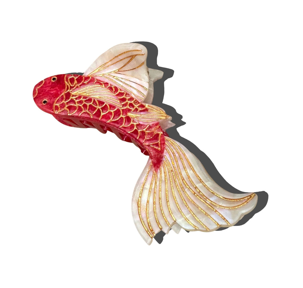 You won't need to fish for compliments with this fun Koi-shaped hair clip. Carefully crafted from cellulose acetate - an eco-friendly, biodegradable material.