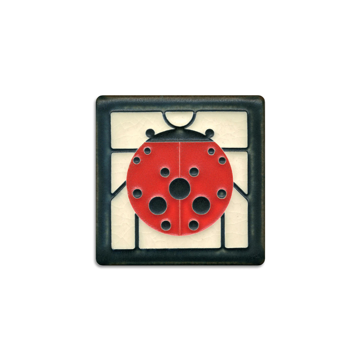 Decorative tile with a red ladybug design on a white background