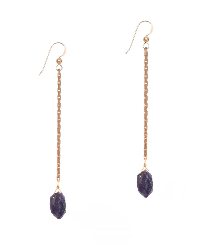 These effortlessly chic earrings feature hand-cut lapis gemstones suspended from vintage brass chains. Each natural gemstone is unique making no two pairs exactly the same. Materials: Recycled vintage brass, artisan-cut natural lapis gemstones. 14k gold-fill earwires Dimensions: 3" x 0.25" approx.