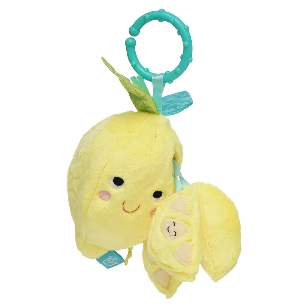 Fruity fun for little ones on the go! This lemon travel toy has embroidered facial features and a zippered compartment that holds three soft fabric lemon slices. Tethered by silky-soft ribbons, each slice includes three unique features - rattle, squeaker and crinkle textures. It easily attaches to carriers, strollers, cribs and more with its textured plastic C-clip that doubles as a teether.