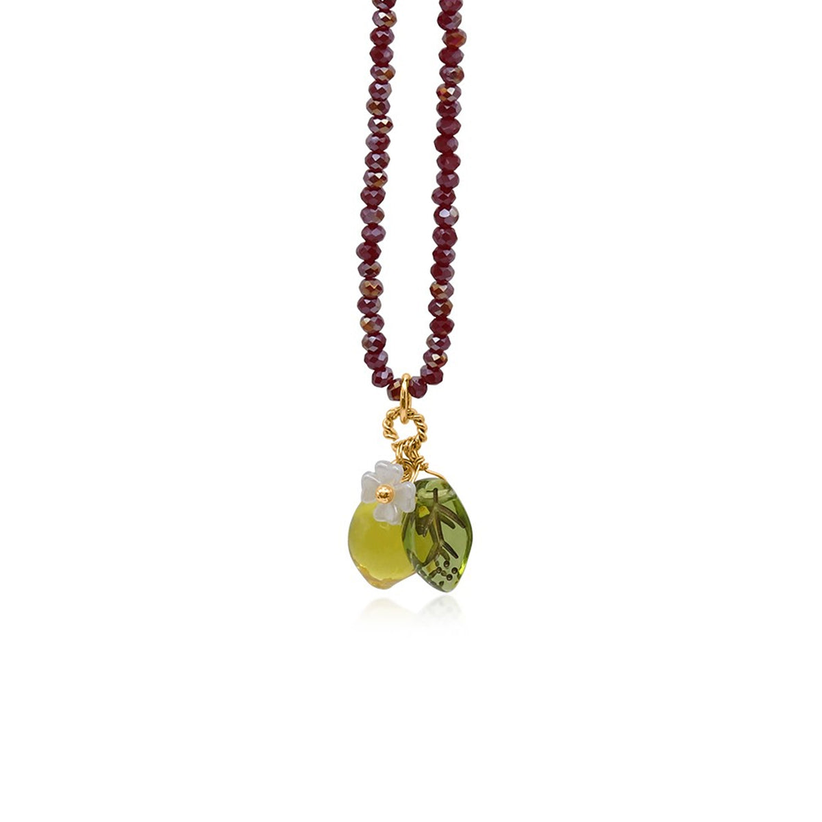 A beaded necklace featuring dark red faceted beads, a gold-toned ring connector, and a lemon-shaped pendants in olive green and yellow-green, with a small white flower accent, shown on a plain white background.