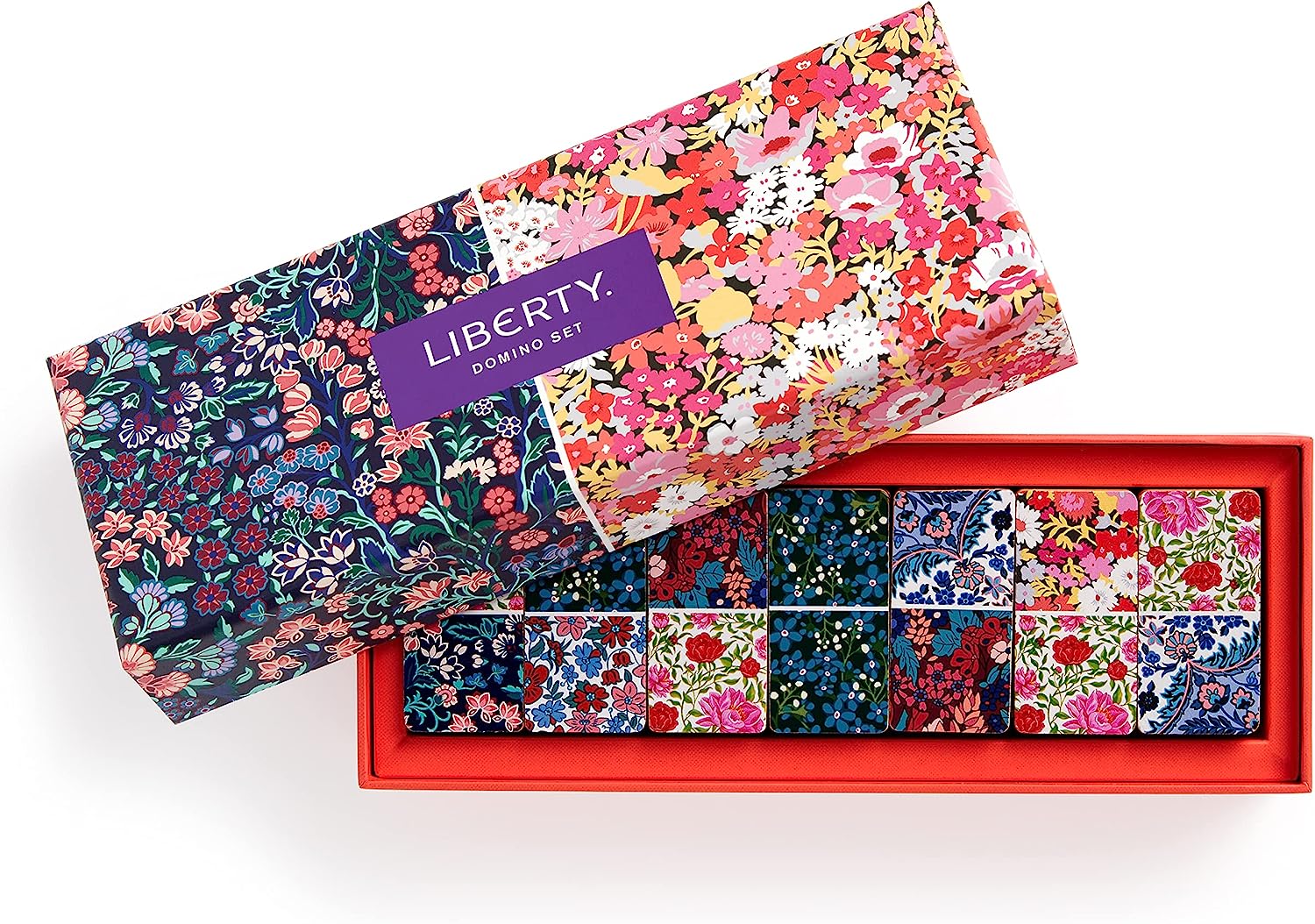 The classic game of matching tiles that everyone loves to play, revitalized in gorgeous Liberty print florals. This special set of wooden dominoes features full-color Liberty London iconic floral patterns on both sides. The perfect addition to any family game night.  28 wooden dominos. All ages.