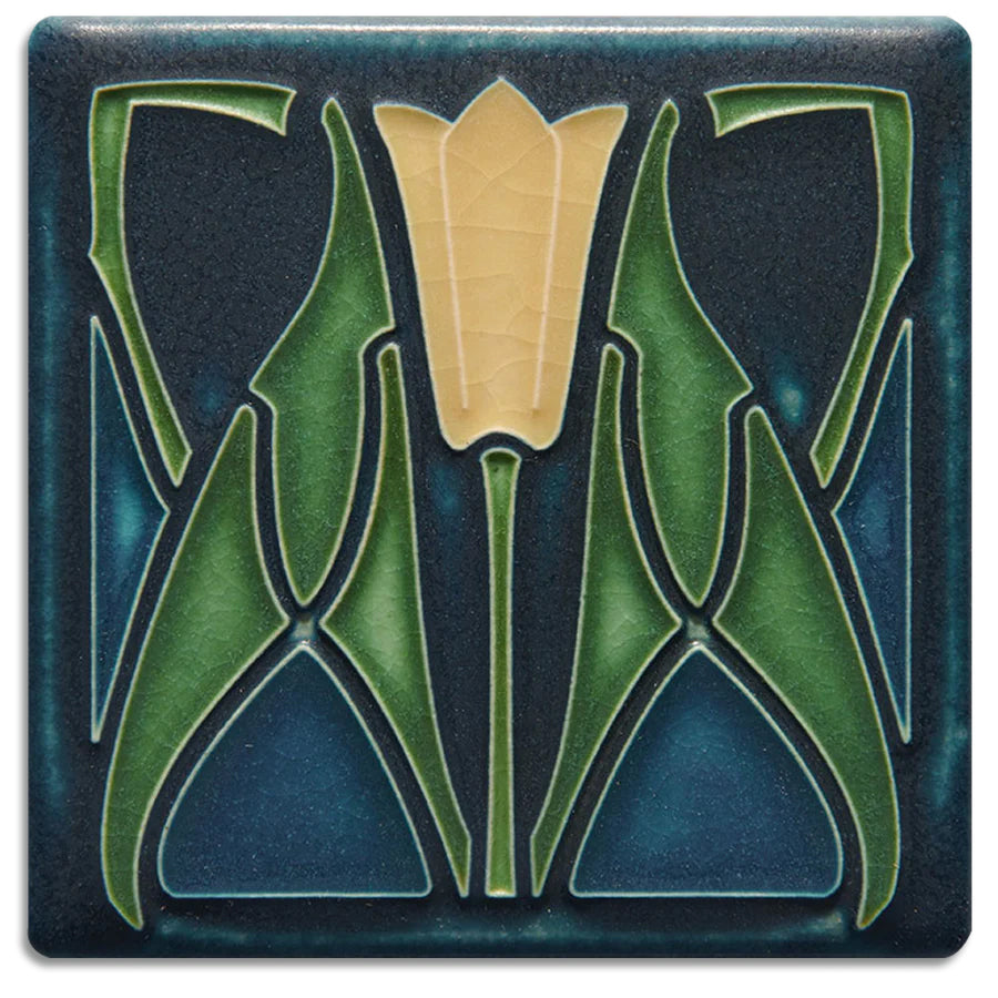 This lotus flower ceramic tile is handcrafted in the style of the Arts and Crafts movement. Motawi Tileworks have hand-trimmed and hand-glazed each and every tile. The whiplash floral motif is pure nouveau while the border design is pure Motawi. Tiles are 5/8" thick and have a notch at the back for hanging unframed. 