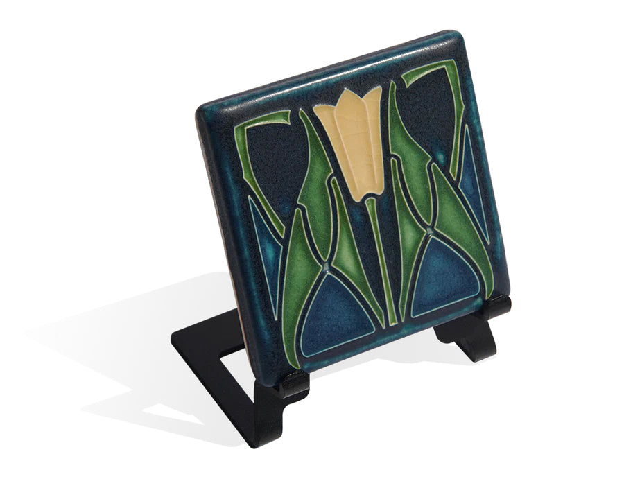 This lotus flower ceramic tile is handcrafted in the style of the Arts and Crafts movement. Motawi Tileworks have hand-trimmed and hand-glazed each and every tile. The whiplash floral motif is pure nouveau while the border design is pure Motawi. Tiles are 5/8" thick and have a notch at the back for hanging unframed. 