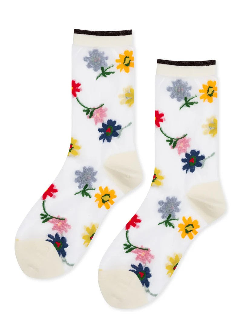 Because nothing says spring more than a floral bouquet, this sheer pair has a sweet mix of flowers floating around. Slip yours on for field frolics and park strolls alike. What a fresh pick! These gorgeous sheer socks have a super high needle count, making them soft yet durable.