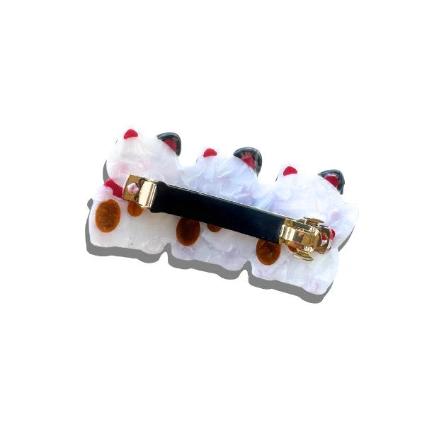 Add some extra luck to your hairdo with this triple-lucky cat barrette. This classic French-style barrette clip is finished with hand-painted details and crafted in small batches. It is perfect for both shorter and longer hairstyles. Material: Cellulose Acetate-crafted from an eco-friendly, biodegradable material made from recycled wood pulp.