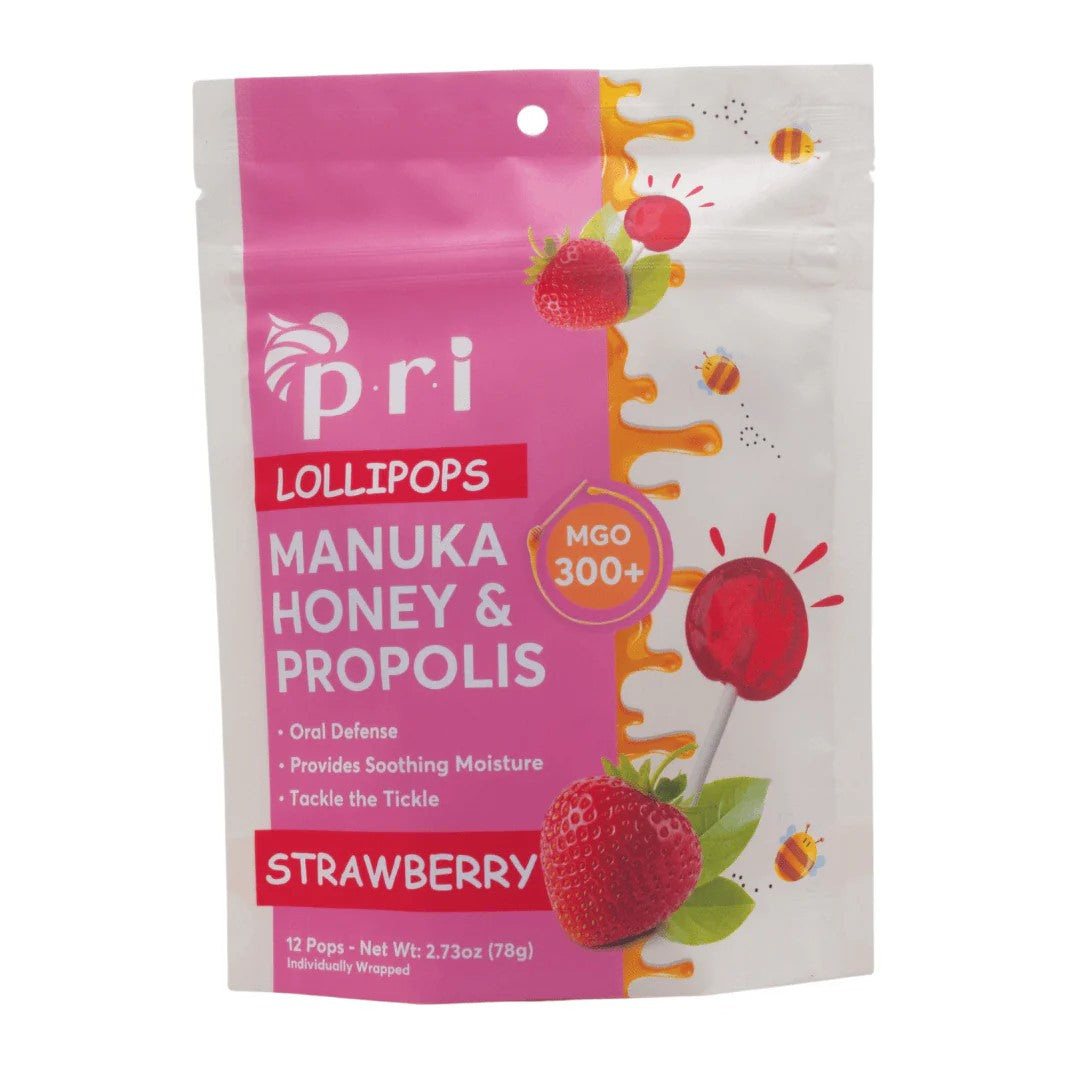 Packaging of strawberry-flavored Manuka honey and propolis lollipops with pink and white design.