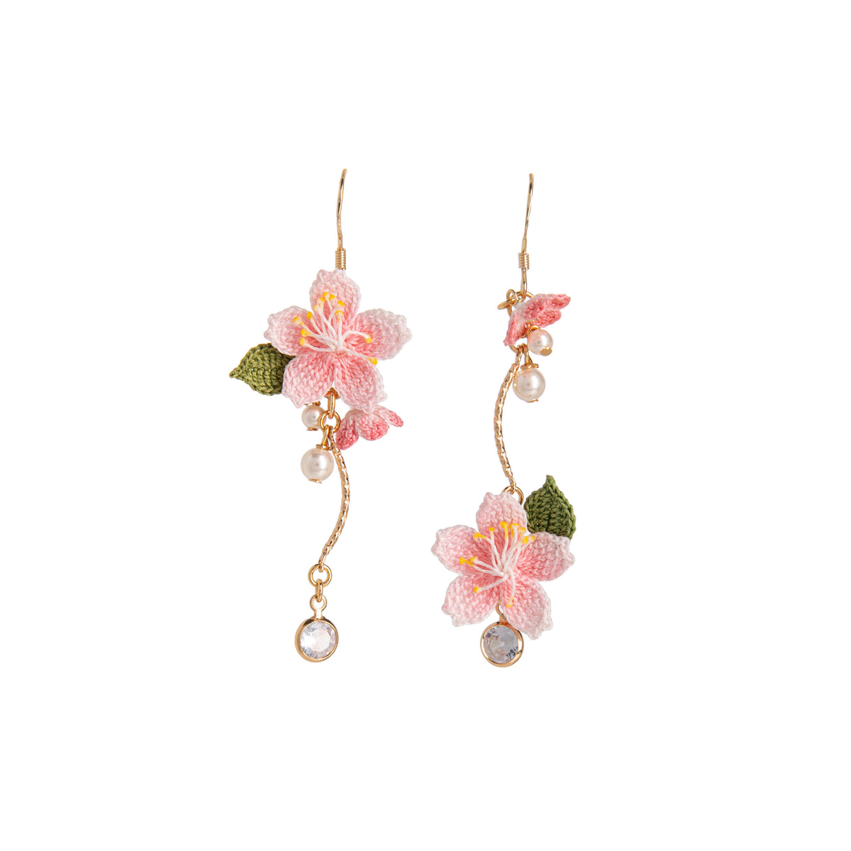 Floral peach blossom earrings with pink flowers and gold accents on a white background