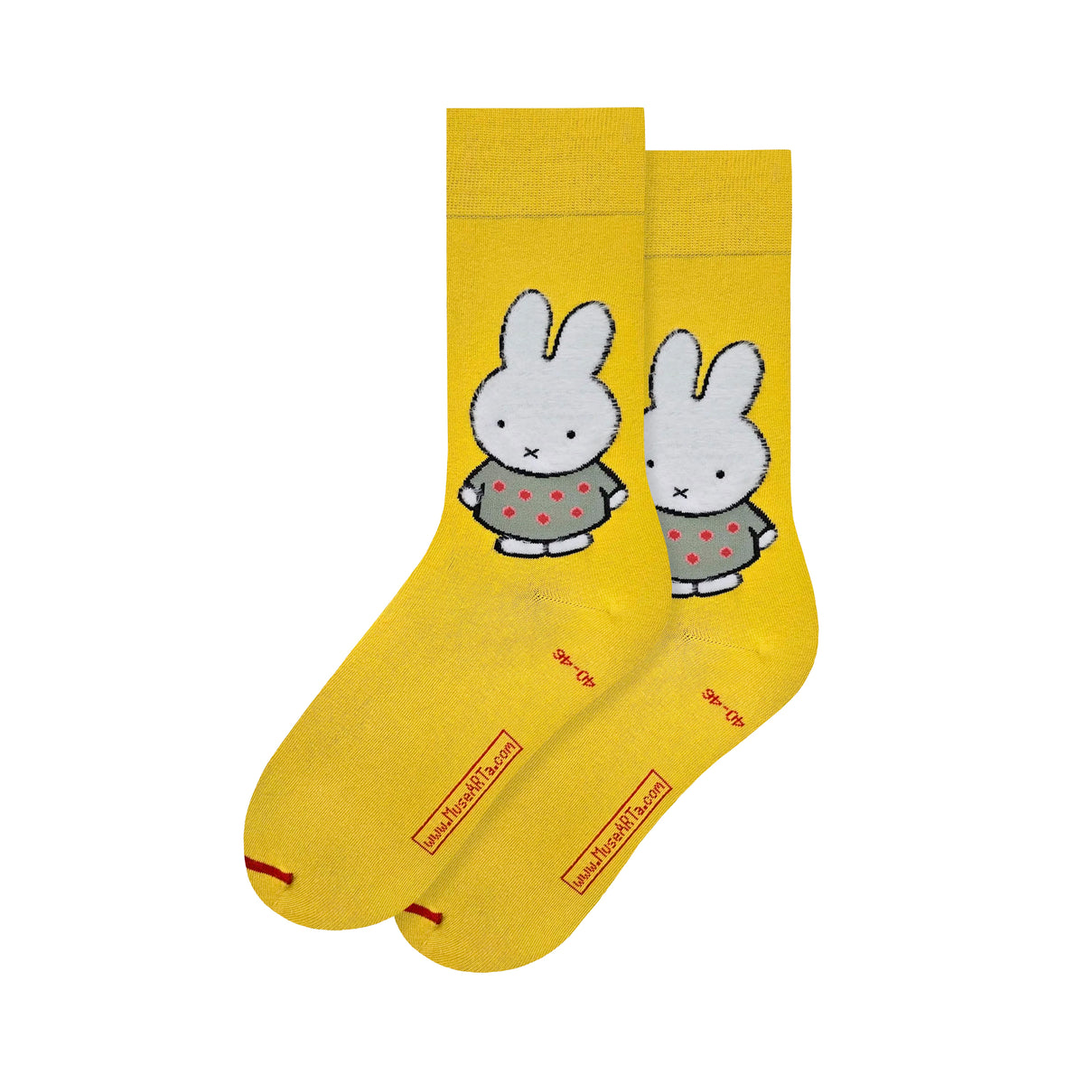 A pair of bright yellow crew socks featuring a cartoon rabbit Miffy by Dick Bruna character wearing a gray sweater with red polka dots, shown on a plain white background.