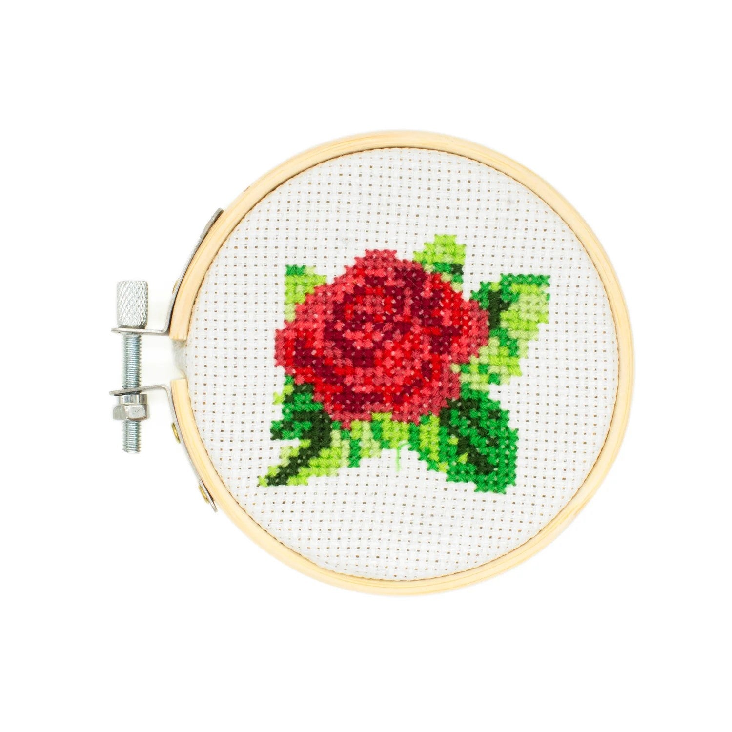 Relax at home, on a break at work or on vacation with this simple, mini cross stitch kit. This beautiful Rose embroidery kit includes a bamboo hoop frame, canvas to stitch on, color threads, and 1 needle— everything you need to make the finished piece. Hoop diameter: 3".