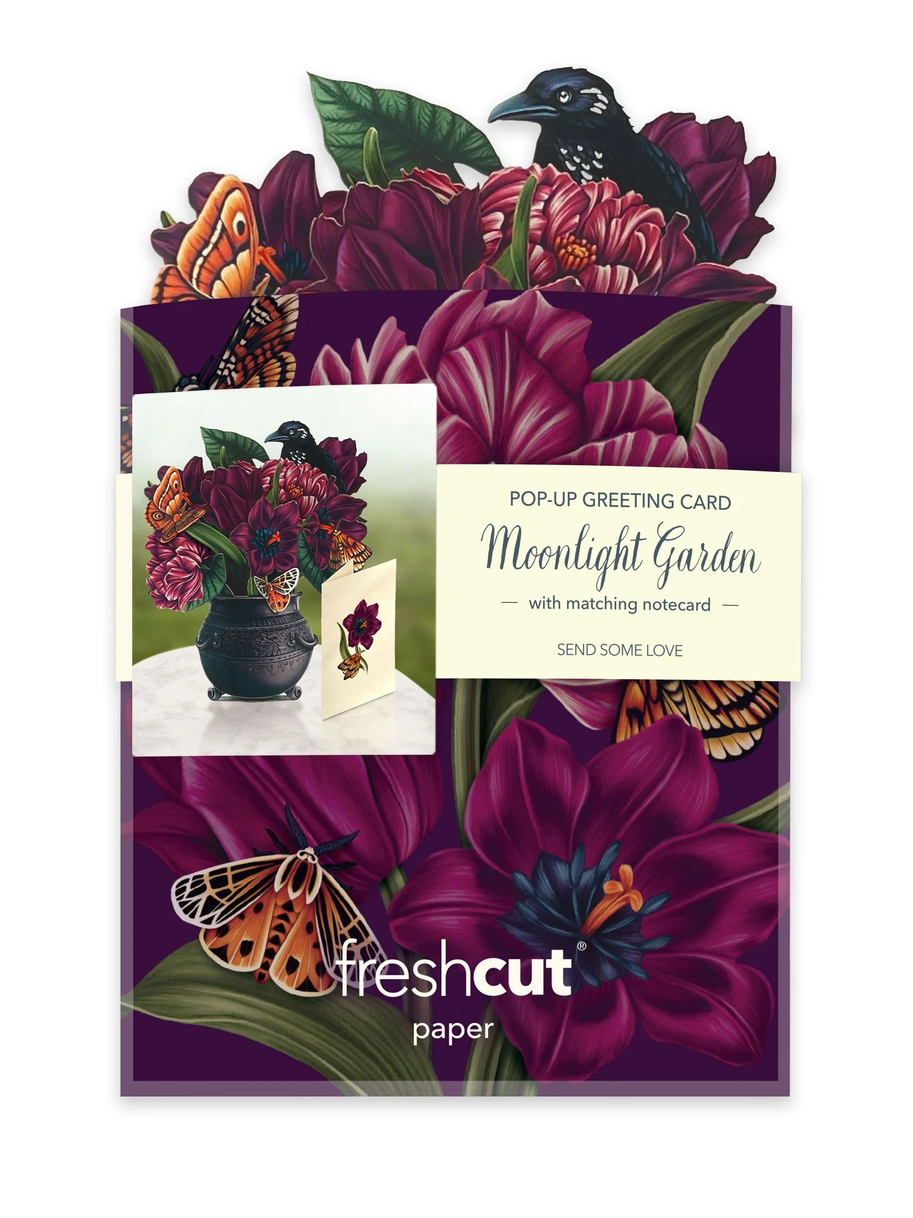 A small but spellbinding display of bewitching beauty enchants the home and office alike in this Moonlight Garden Bouquet pop-up greeting card. Displayed in a stunning pewter-colored cauldron, this mini bouquet of boo-tiful tulips and begonia leaves dazzle with velvety hues of deep purple and merlot. 5.5" x 5".