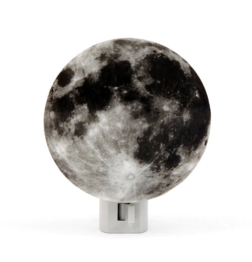 Light up any room with this soft glowing moon light. Features a realistic, three-dimensional printed photo of the moon which will gently light your way, or sooth a child to sleep with cosmic dreaminess. Measures: 4" x 3.5" x 2.5" 7-watt bulb included. Manual on/off switch.