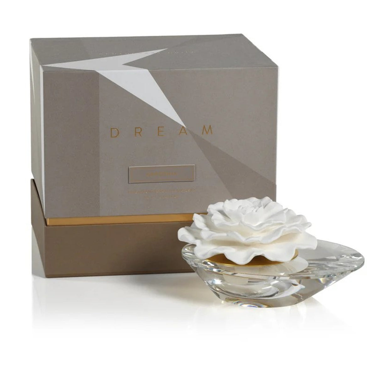 Crystal and porcelain flower-shaped fragrance diffuser with a grey box on a white background