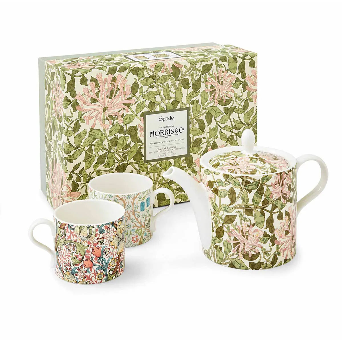 Tea set with Morris & Co floral patterns including a teapot, cups, and a box on a white background