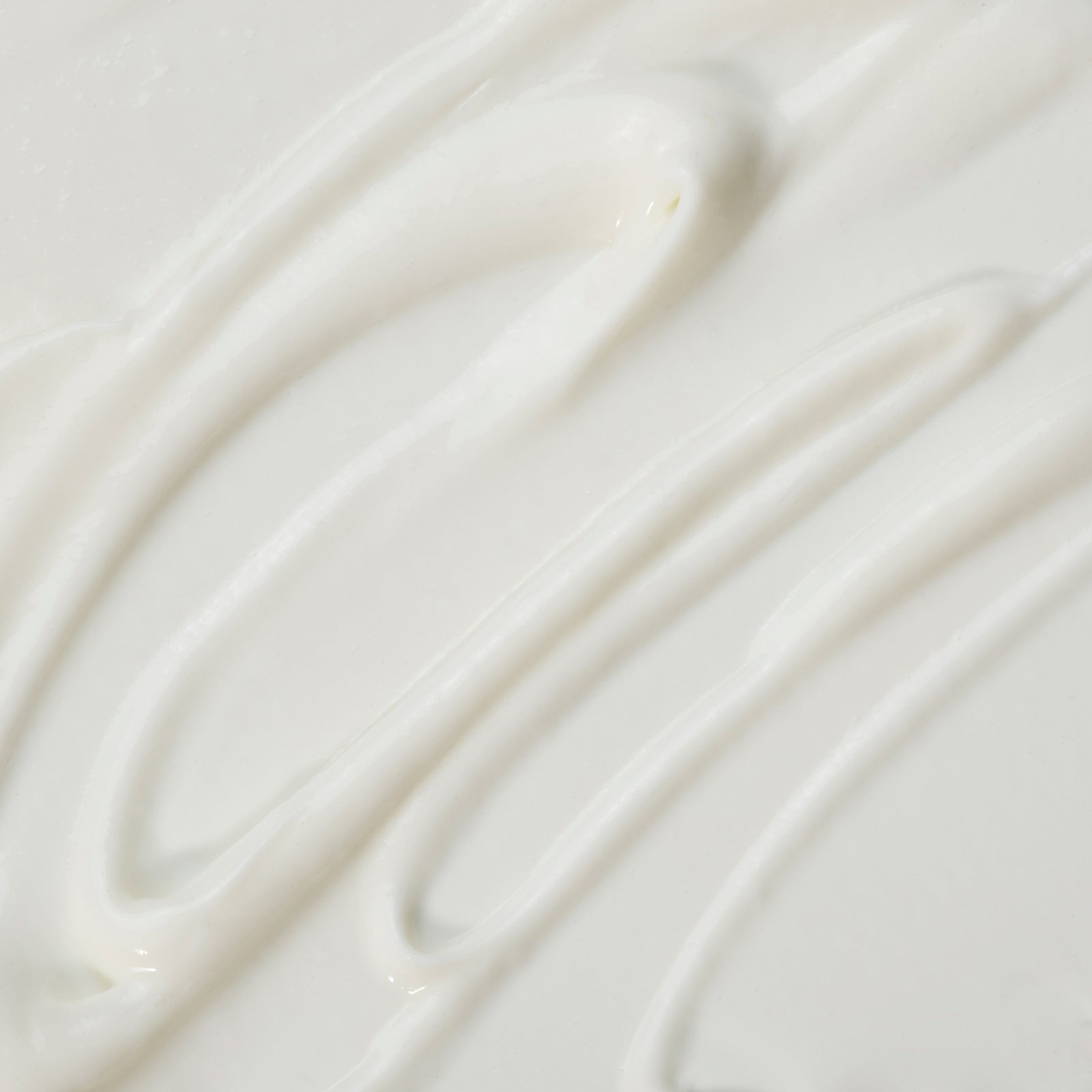 Blue bottle with pump dispenser on a white background