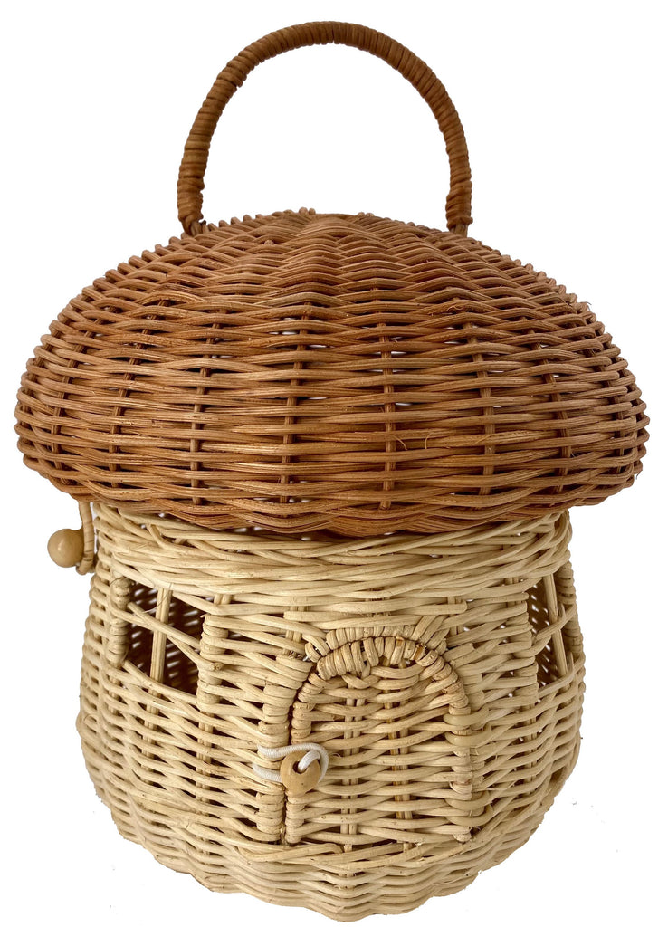 Meet the Mushroom Basket. With a generous size, adjustable handle, and a little door (which opens and shuts), kids and adults alike can open the Mushroom top and carry teeny treasures, or grown-up essentials with them wherever they go. Made from 100% Natural Rattan. Dimensions: H 8.6” (11” with handle) x W 8.6”.