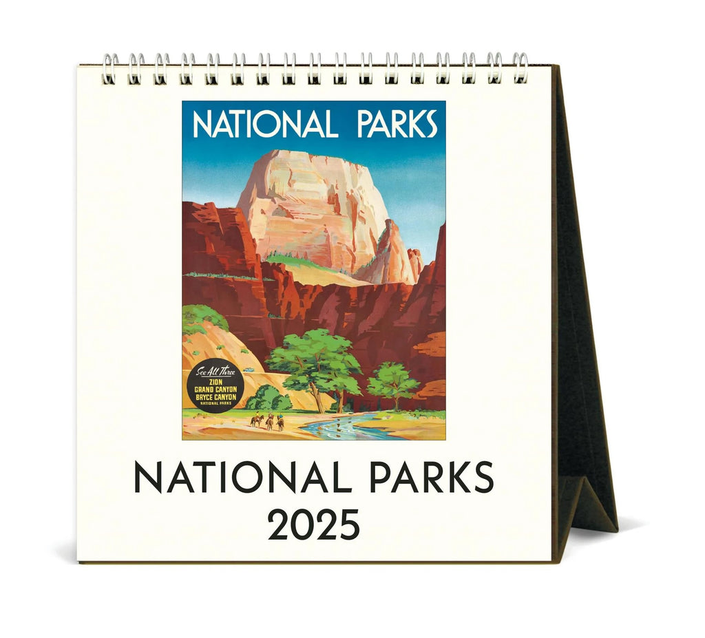 Be reminded of past visits, or plan new adventures with this fabulous desk calendar, featuring vintage travel posters and stickers from 12 US National Parks. This 2025 calendar features a different, archival quality image for every month. Desktop size measures 6" x 6.5" When open.