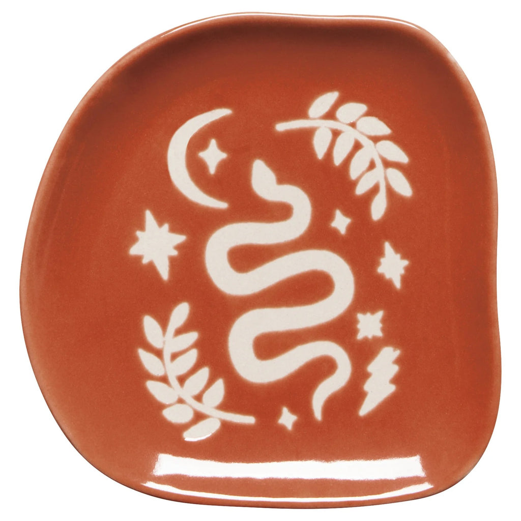 Celebrate the Year of the Snake year-round with this gorgeously glossy trinket tray. This ssssssweet little tray can be used for serving snacks, holding keys, or to keep your favorite jewelry pieces in place. Material: Ceramic Dimensions: 4.25" x 4.25" x 0.5" Hand wash