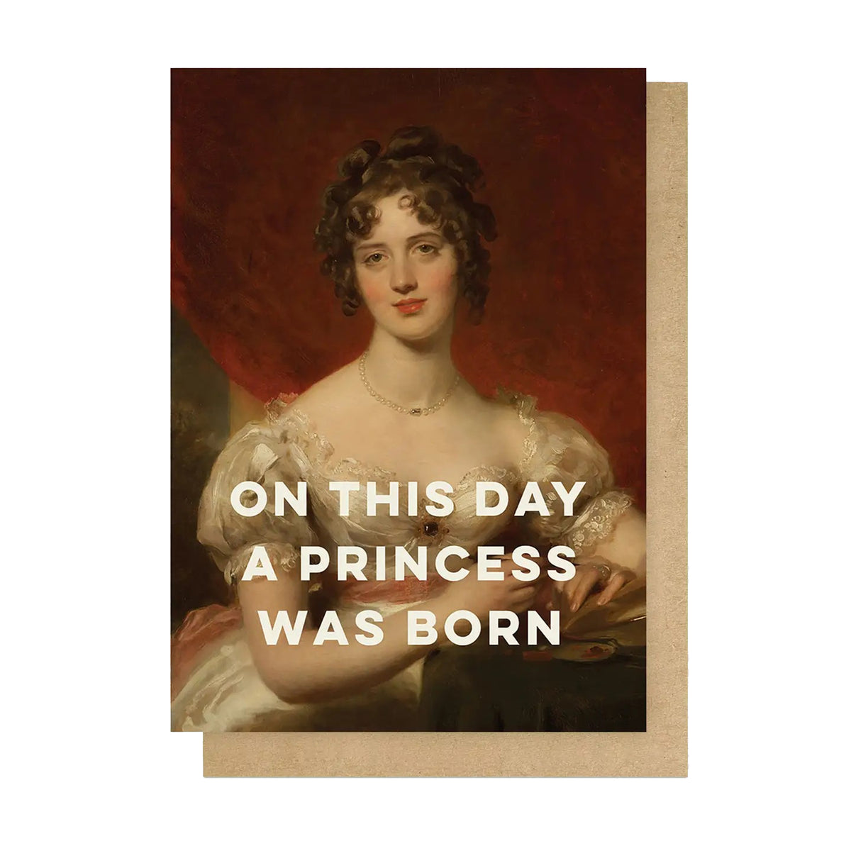 Greeting card with portrait of a woman and text 'On this day a princess was born' on a plain background