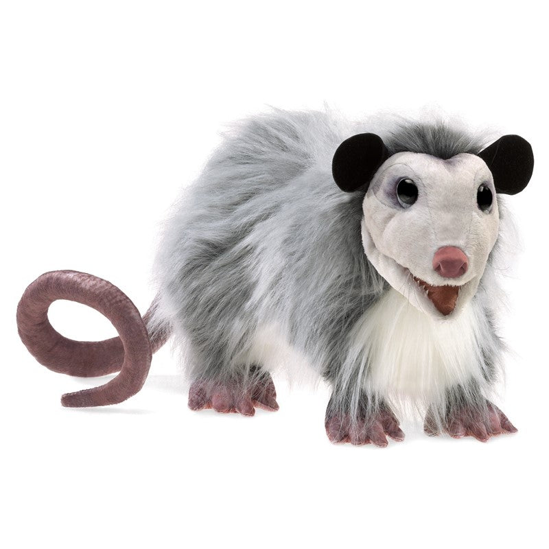 Creepy yet cute, this life-size Opossum puppet is realistic enough to fool your friends. Play "possum" and be ready for squeals of delight and awe when you animate the mouth and display the marsupial's printed tail. Hand puppet with moveable mouth and forelegs Dimensions: 24" x 9" x 8"