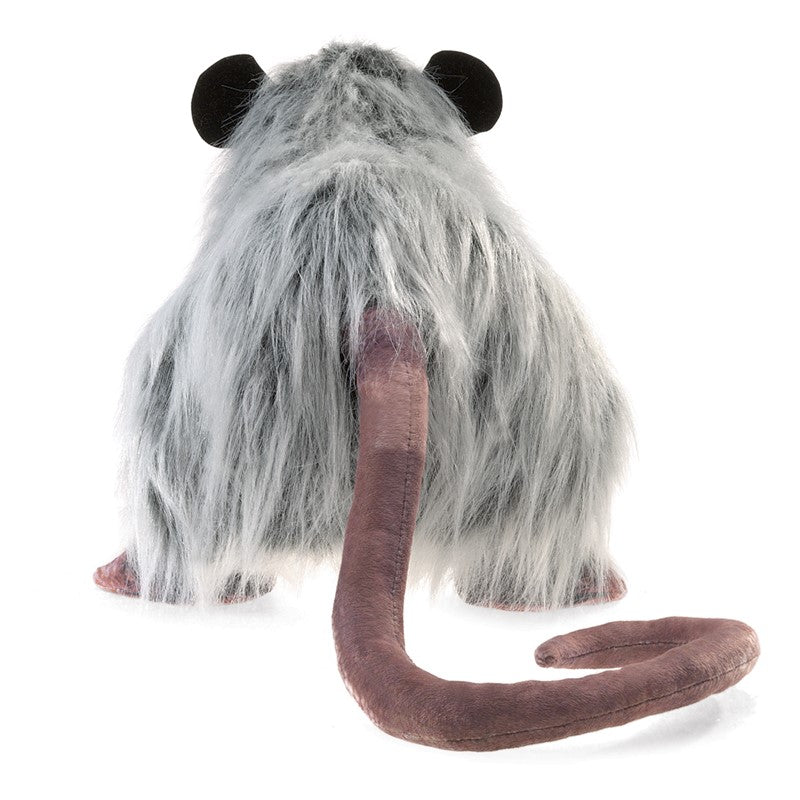 Creepy yet cute, this life-size Opossum puppet is realistic enough to fool your friends. Play "possum" and be ready for squeals of delight and awe when you animate the mouth and display the marsupial's printed tail. Hand puppet with moveable mouth and forelegs Dimensions: 24" x 9" x 8"