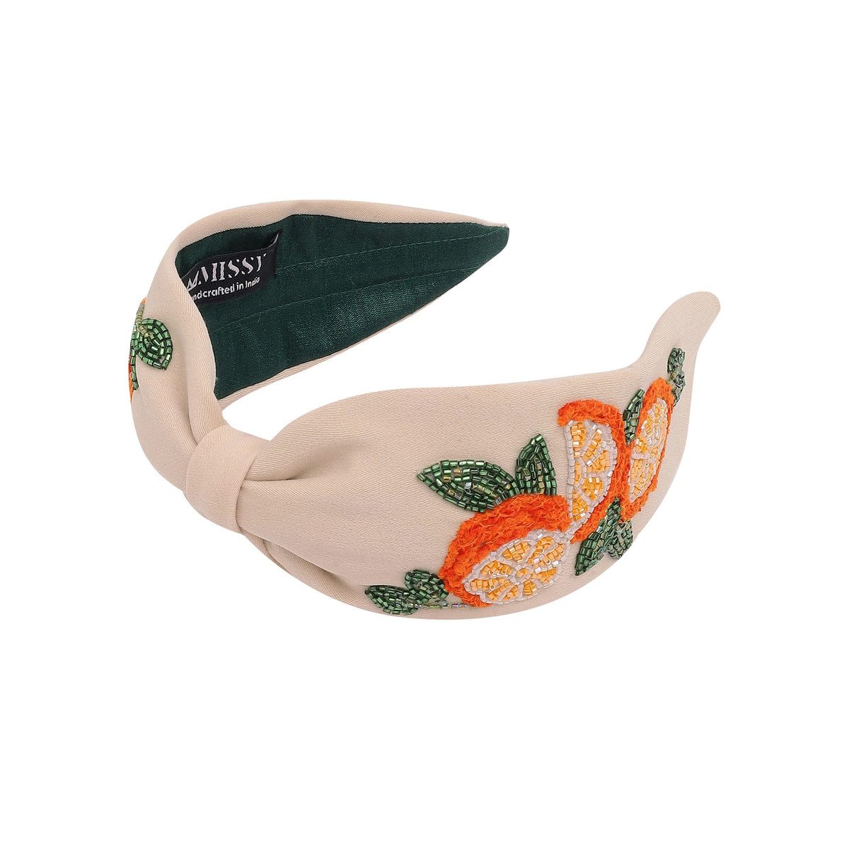 Beige headband with orange and green floral embroidery on a white background
