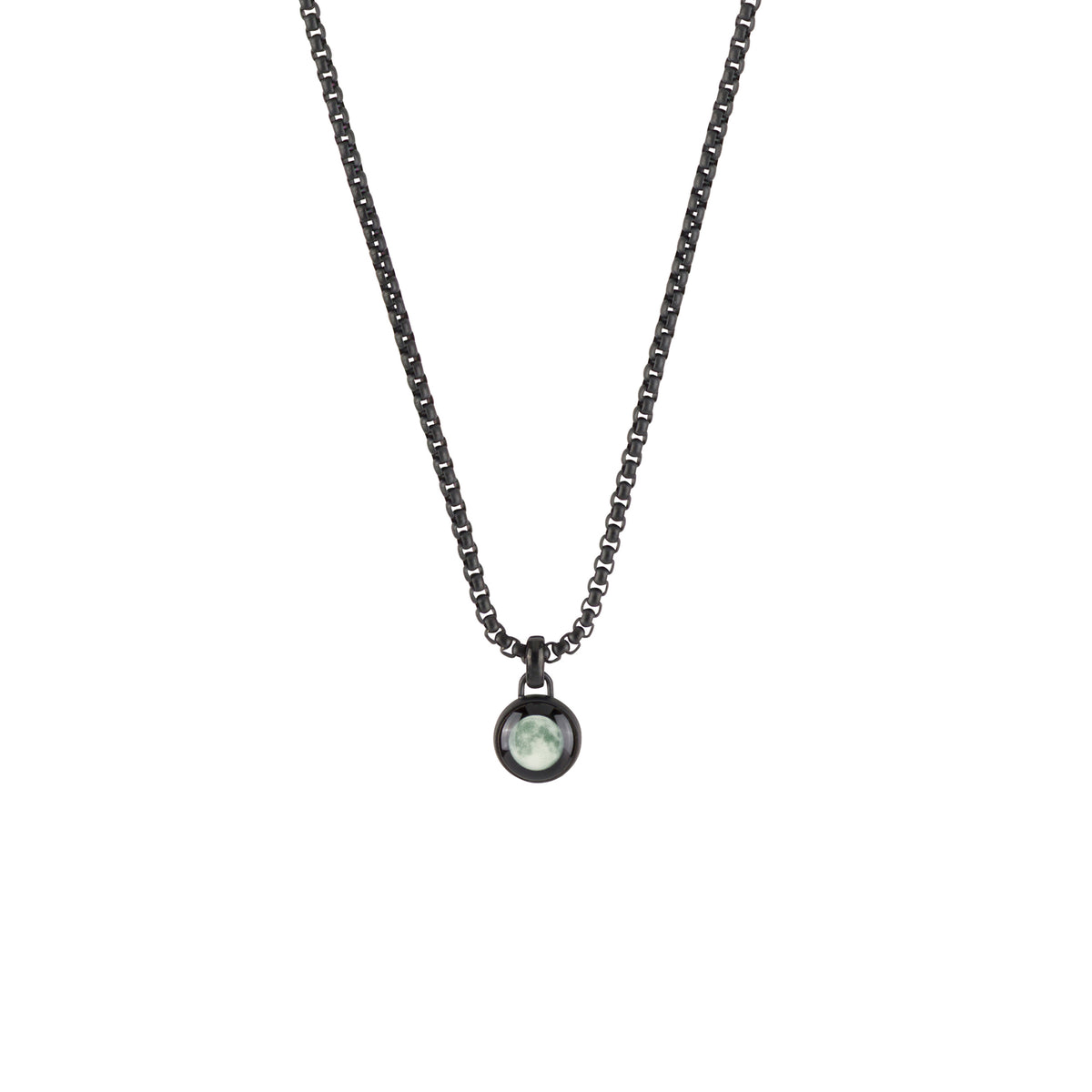 A dark gunmetal chain necklace with a small oval bezel-set light green gemstone pendant, shown against a plain white background.