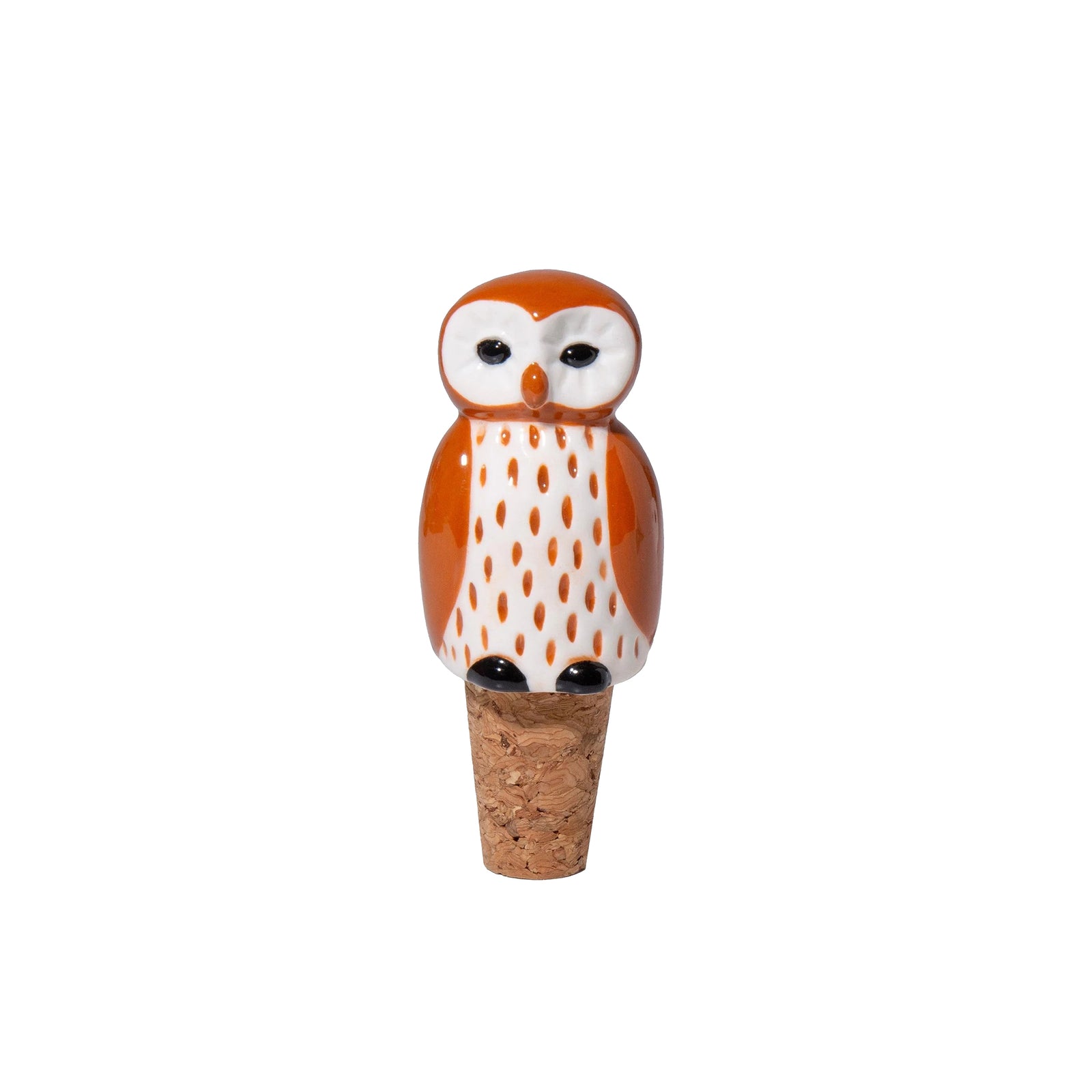 An owl-shaped wine stopper featuring a brown and white patterned ceramic owl perched on a cork base, set against a plain white background.
