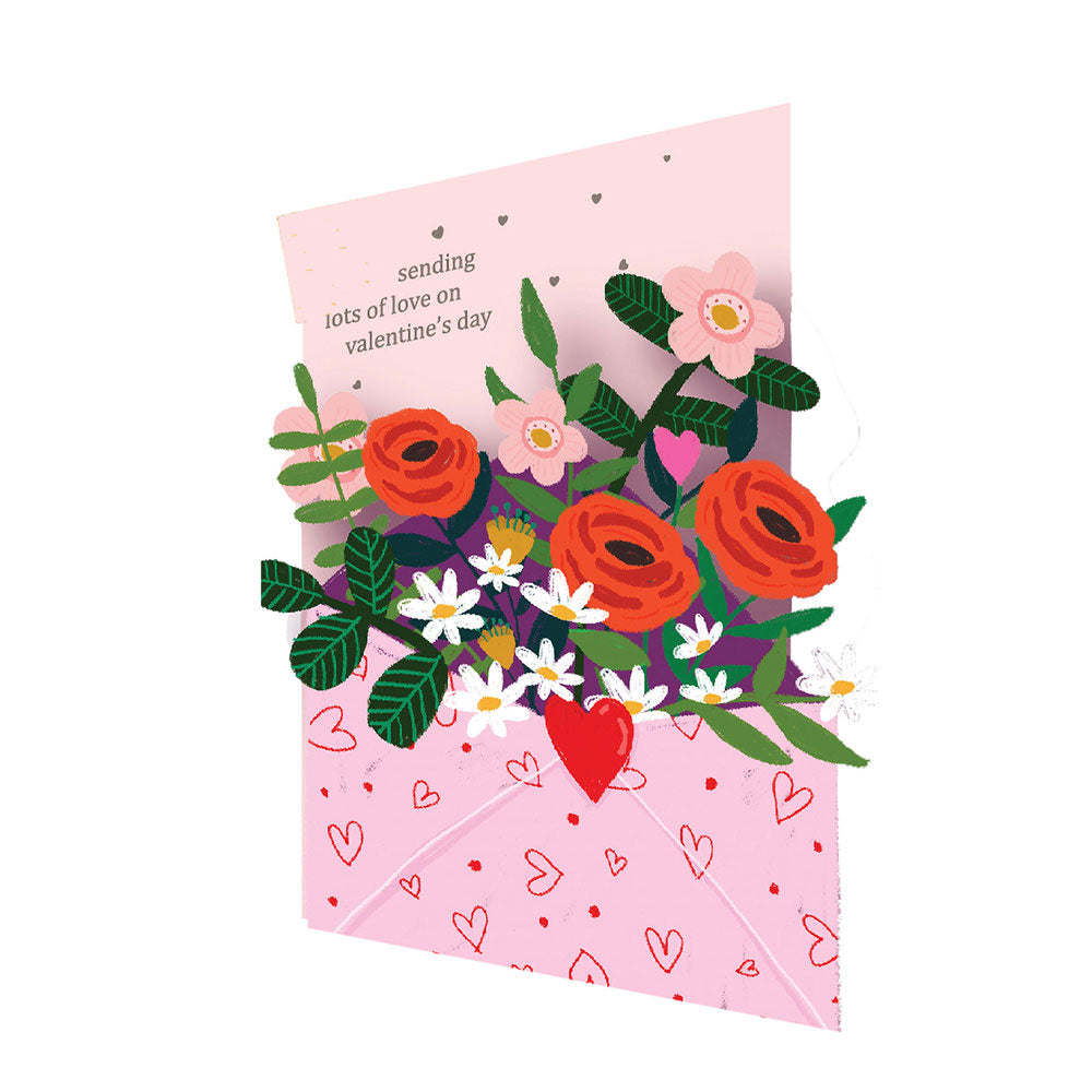 Send hearts and flowers to a loved one with this pretty Valentine's greeting card. Made from layered, die-cut art paper which gives the card a 3-D effect when opened. Die-cut card Envelope included. Dimensions: 4.5" x 6.5" Printed using eco-friendly inks. 100% recyclable.