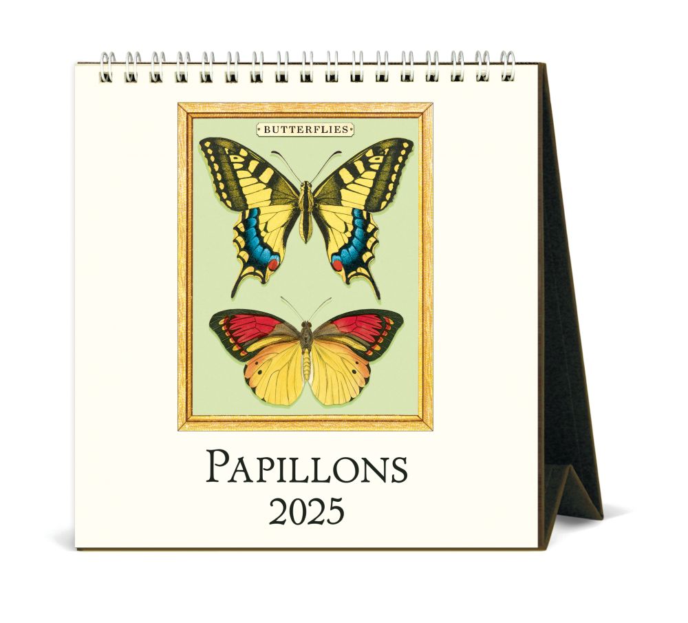 Stay organized and on top of the year with this 2025 desk calendar featuring a selection of exquisite 18th and 19th-century butterfly prints. Bring a touch of colorful nature to your desktop, and enjoy a new vintage print each month. Spiral bound with easel stand. Dimensions: 6” x 7” x 3” when expanded