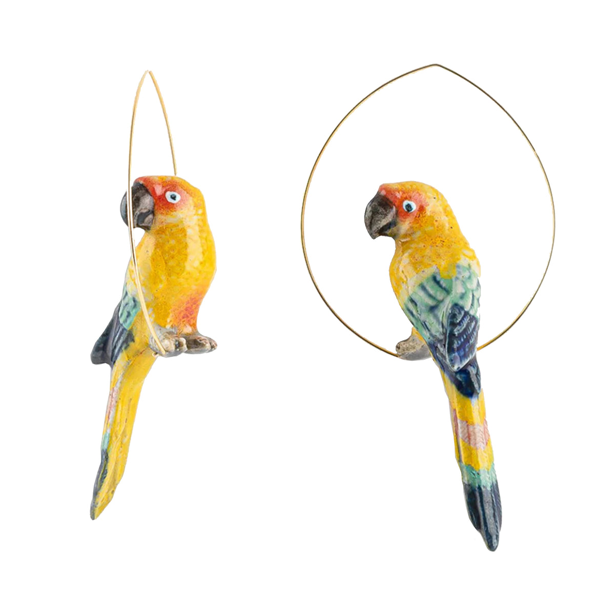 Pair of earrings with two colorful parrot figurines on gold hoops against a white background