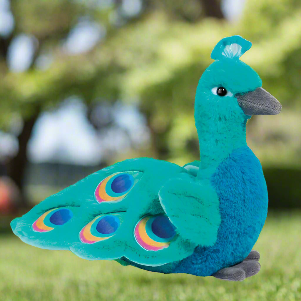 Plush peacock toy on a white background
