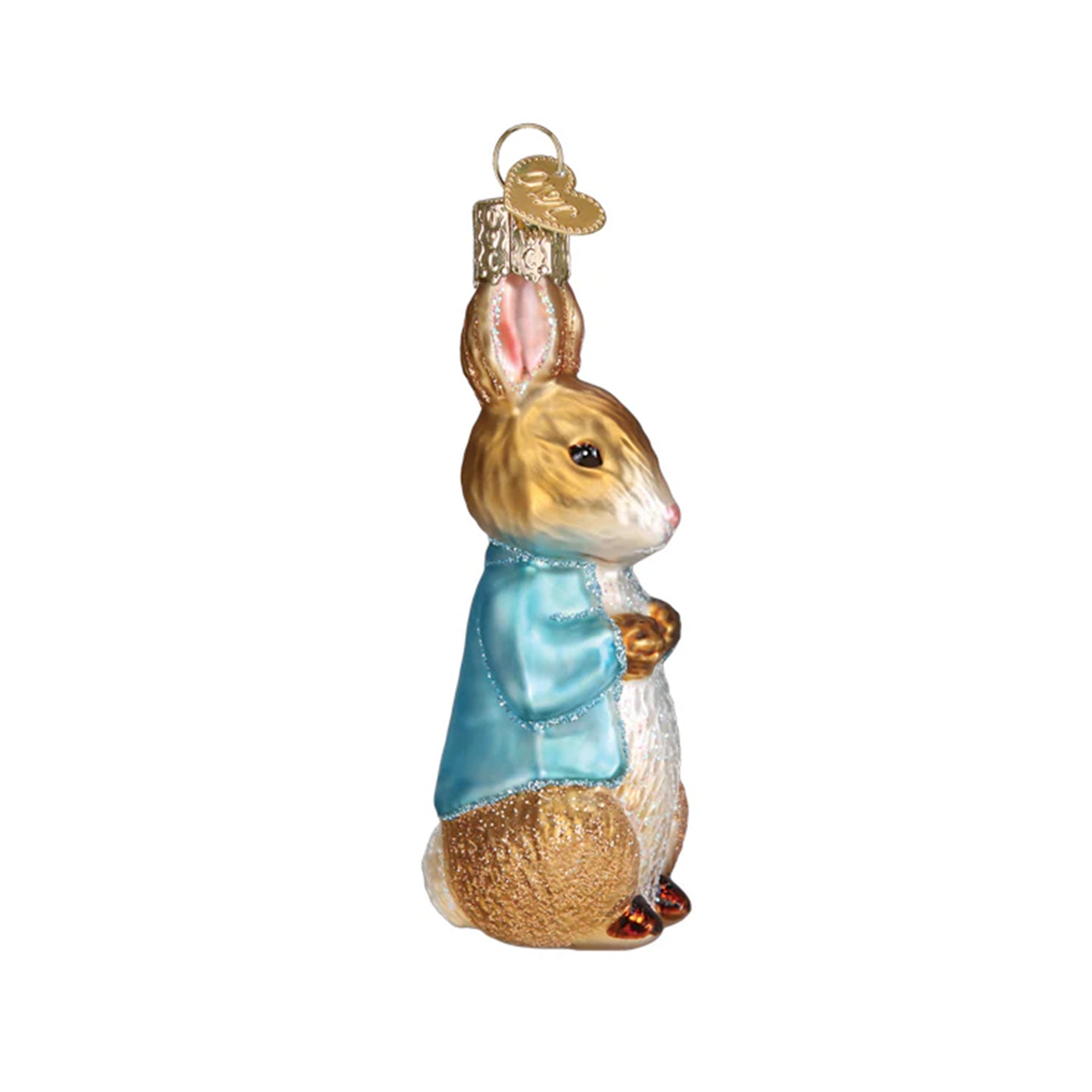 Glass ornament of Beatrix Potter's Peter Rabbit with a blue sweater on a white background