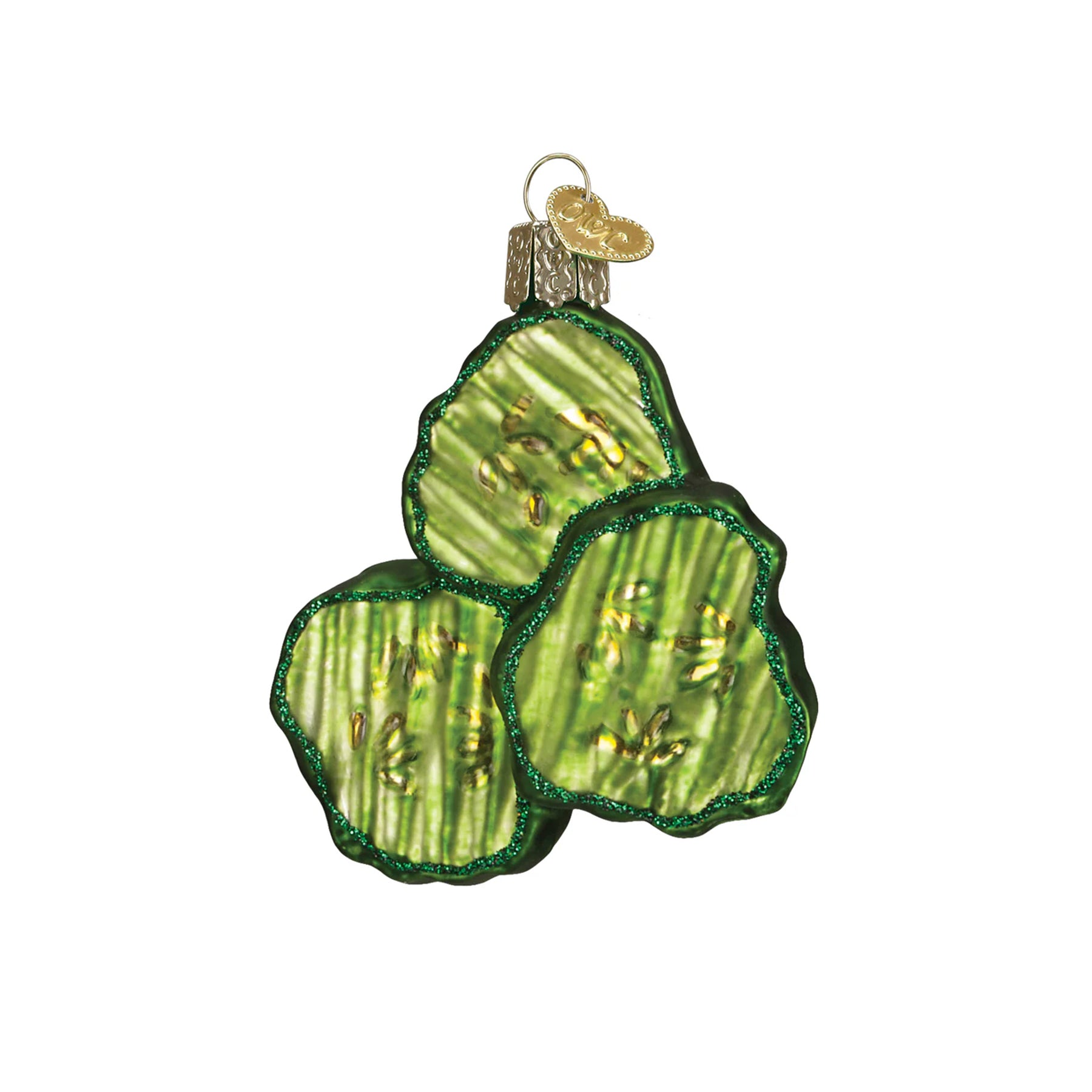 Decorative glass ornament shaped like pickle slices on a white background
