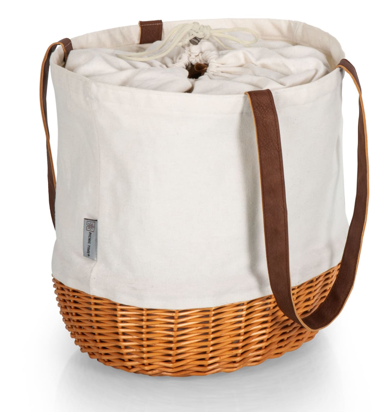 Somewhere between a durable wine and cheese picnic tote and a stylish beach bag, this stylish Canvas and Willow Basket Tote is the perfect companion wherever you're headed. Canvas body with Handwoven wicker bottom Drawstring closure 14.17" x 11.42" x 13.4"