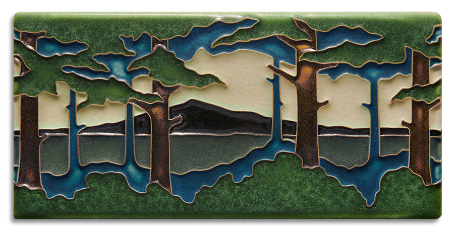 The Pine Landscape series is adapted from Grueby Faience designer Addison LeBoutillier's tile "Pines." This tile is one of the most recognized as a Motawi signature tile. As each Motawi tile is crafted by hand, dimensions may vary slightly by up to 1/16". Tiles are 5/8" thick and have a notch at the back for hanging.