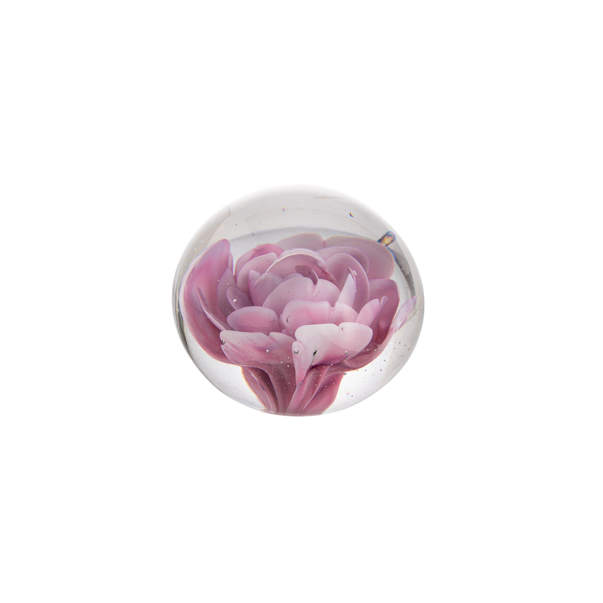 Glass paperweight with a pink floral design on a white background