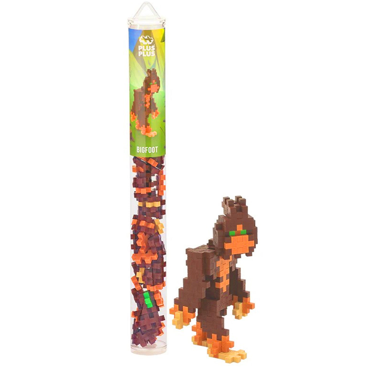 Toy figure of Bigfoot made from interlocking blocks next to its packaging on a white background