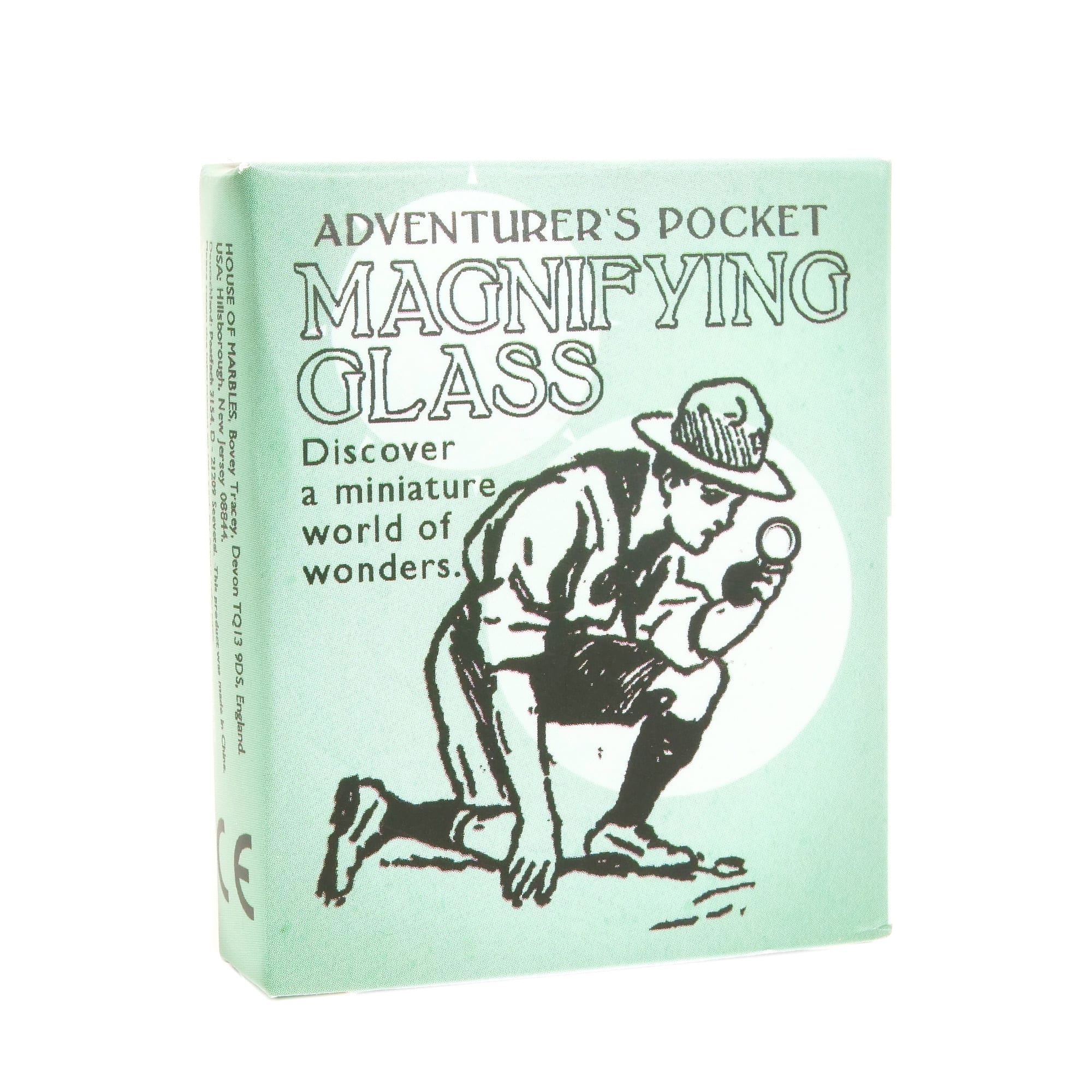 Adventurer's Pocket Magnifying Glass with illustration of a person using a magnifying glass.
