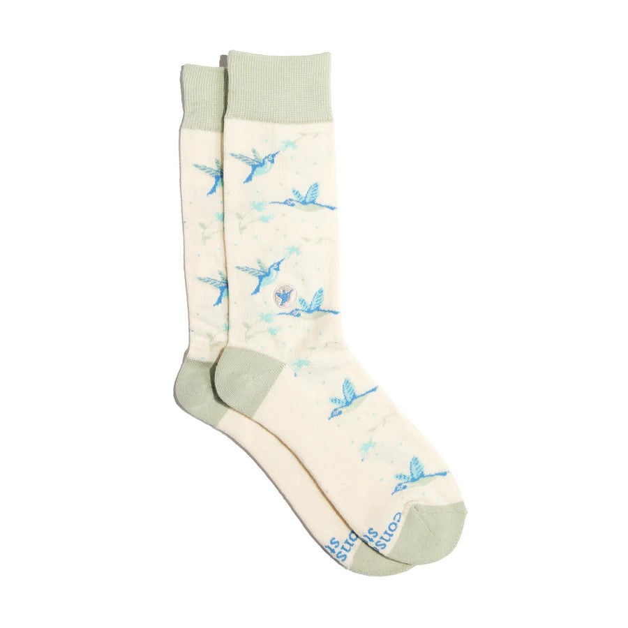 Hummingbirds: they’re small but mighty symbols of near-impossible things. Wear this bright and cheerful hummingbird pair as your reminder that, you too, are capable of wonderful things. Size: US Men’s Shoe Sizes: Small (4-8), Medium (8-13),US Women’s Shoe Sizes: Small (5-9), Medium (9-14). Fairtrade, GOTS, and Vegan Certified Terry padding for comfort Machine wash cold.