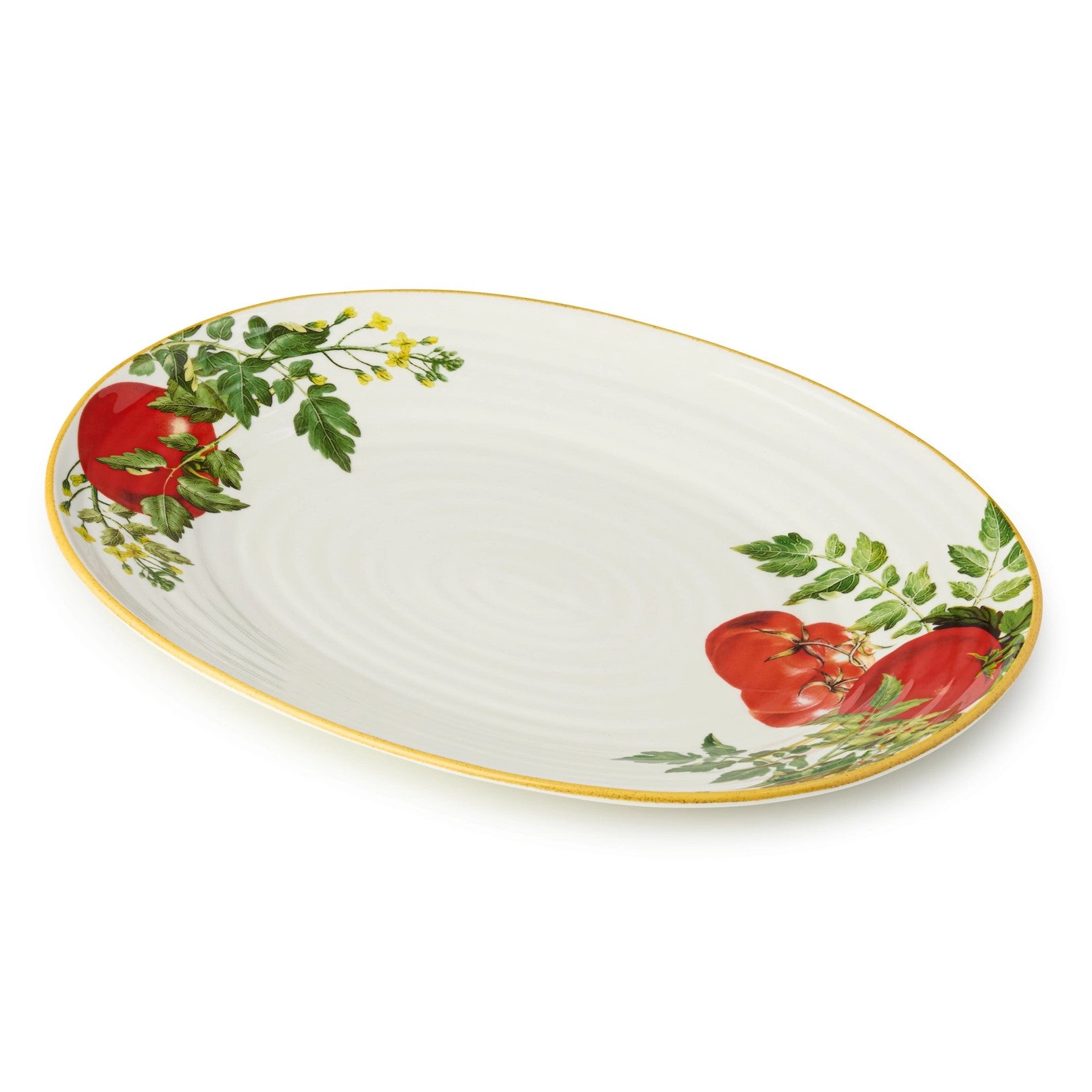 Decorative plate with tomato design on a white background